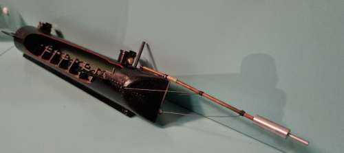 A model of the HL Hunley submarine, showing the mine harpoon at the front, on display at the Submarine Museum. 