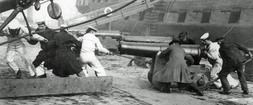 HMS Victory's guns being pulled by her crew. 