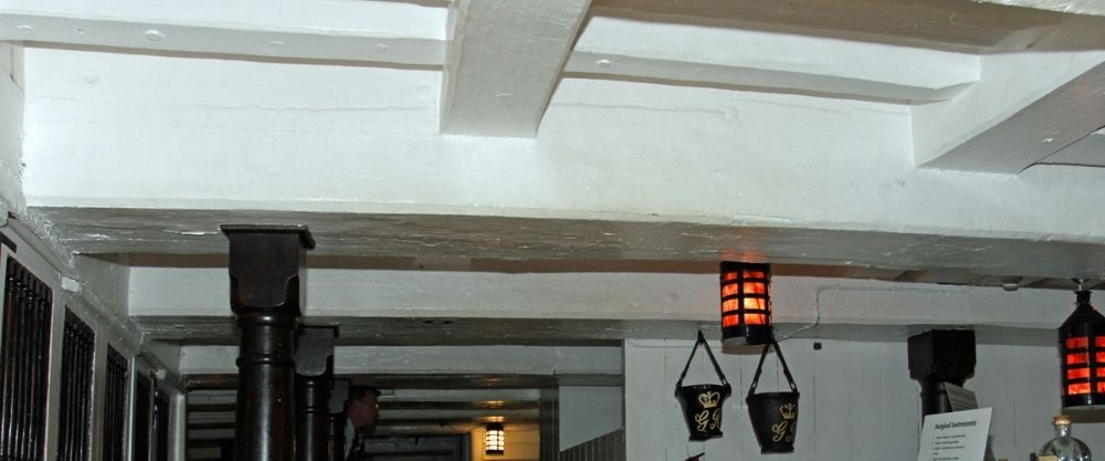 The beams of HMS Victory are white.