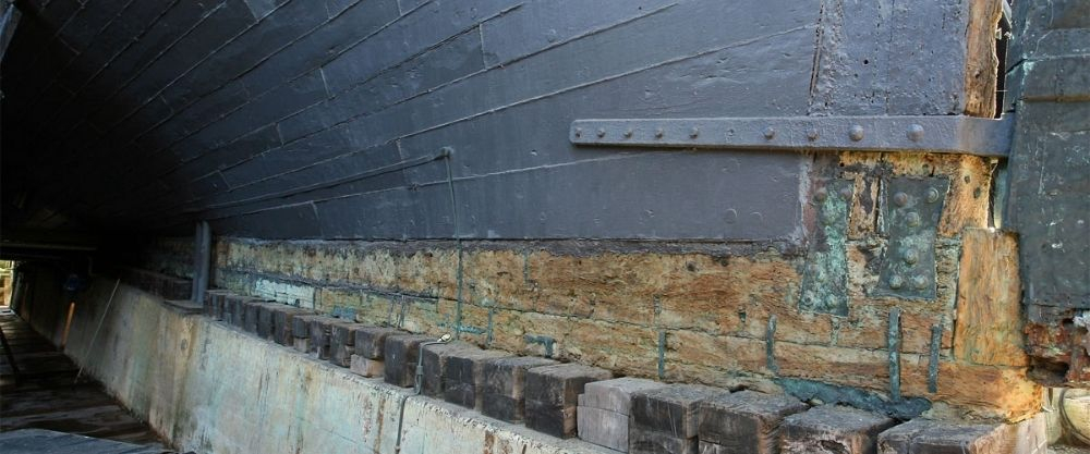 The keel of HMS Victory is weathered. 