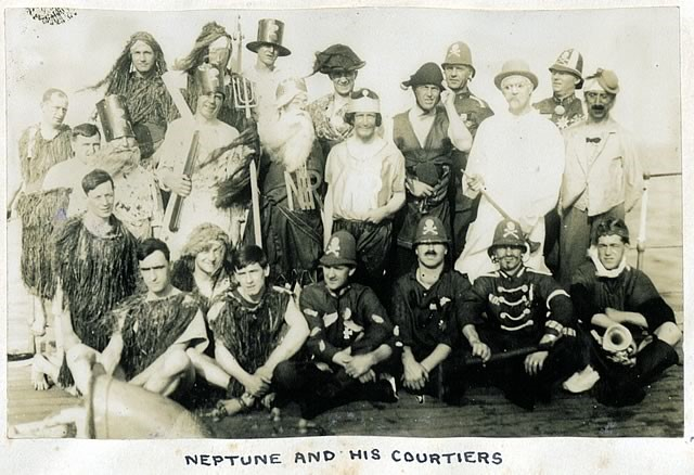 Sailors in fancy dress posing for a group picture. 