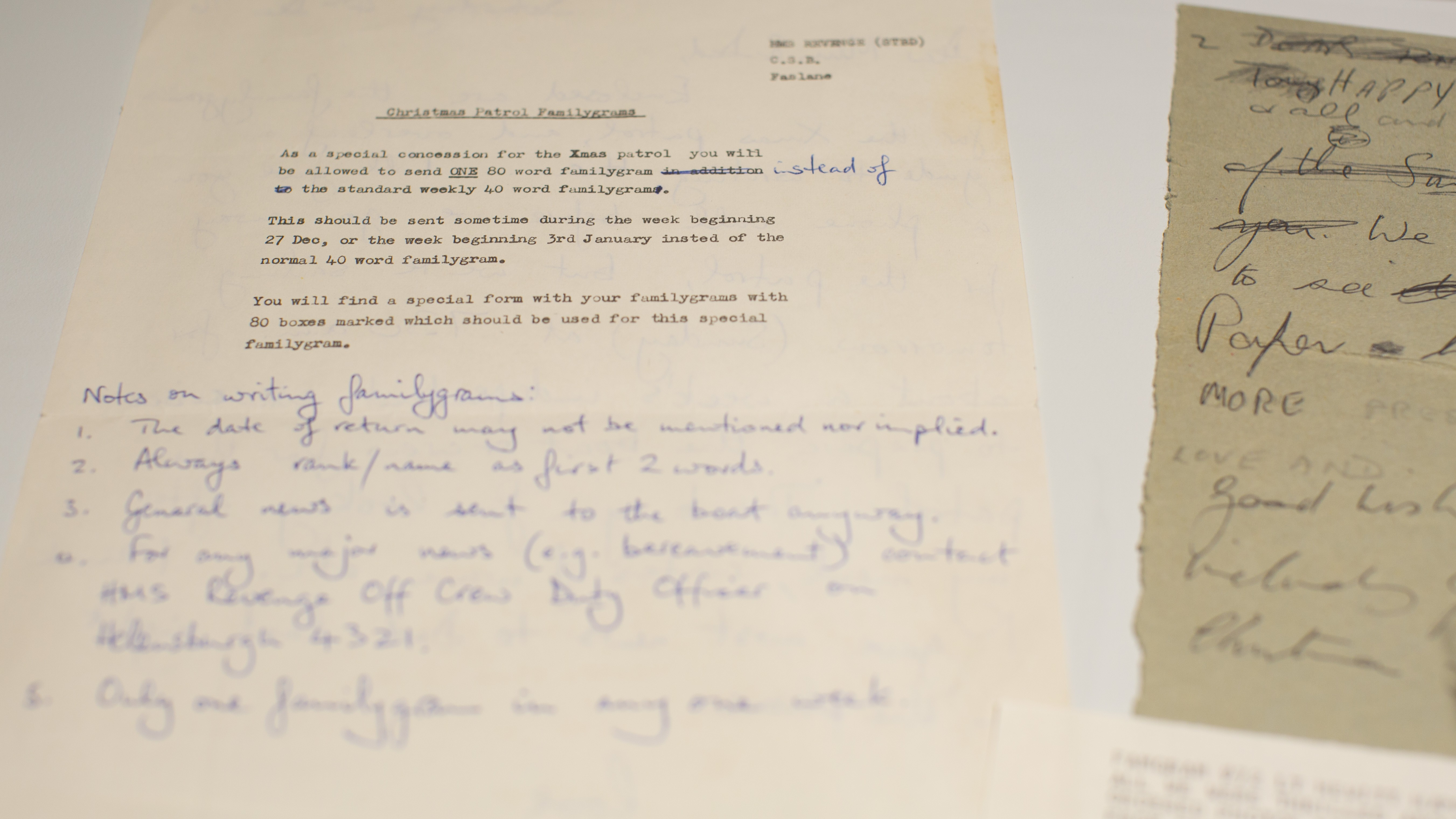 A handwritten note known as a familygram, alongside a typed note showing guidance on what could be included in the familygram