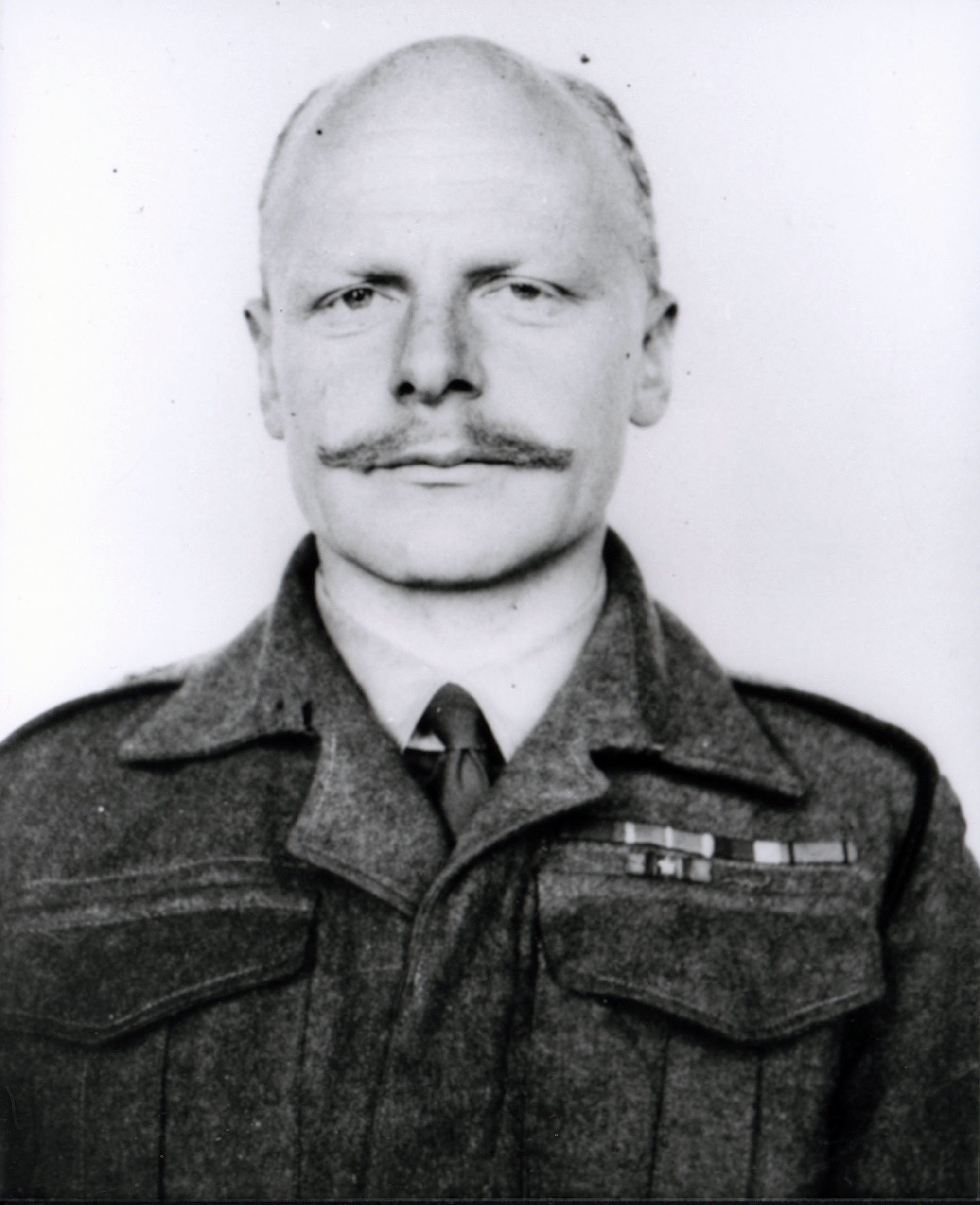1942 black and white portrait photograph of Major H.G. 'Blondie' Hasler in military uniform