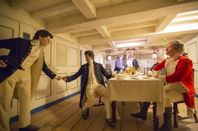 Three mannequins posed as Georgian Officers in HMS Trincomalee's ward room.