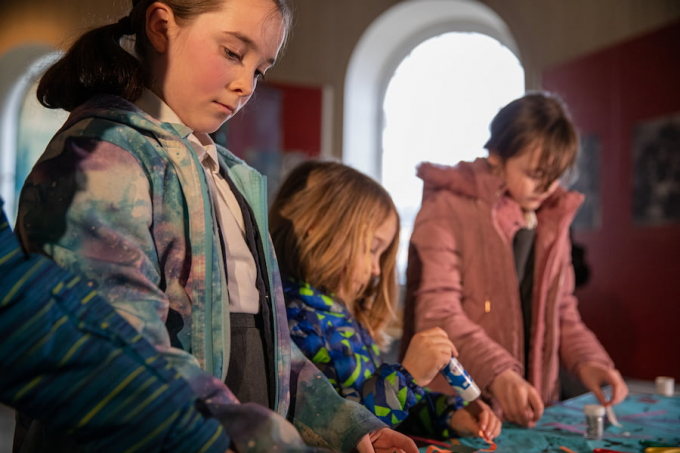 School children taking part in an activity at Explosion Museum of Naval Firepower. 