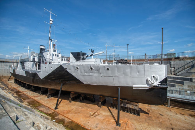 HMS M.33 is kept outside in a dry dock at Portsmouth Historic Dockyard.