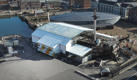HMS Victory is covered by a tent to enable conservation works. 