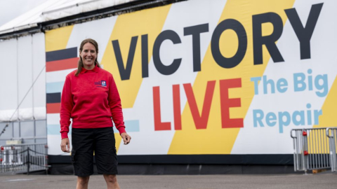 Emily Stokes standing outside Victory Live, the home of HMS Victory.