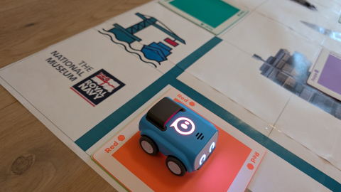 A small robot on a coding maze at the National Museum of the Royal Navy. 