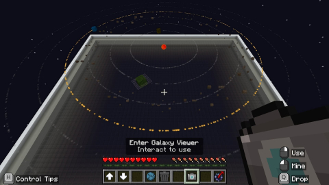 Minecraft Education screenshot of an in-game 'Galaxy Viewer' with orbiting planets and control tips