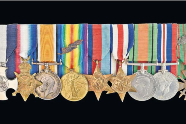 Major Draper's collection of medals against a black background. 