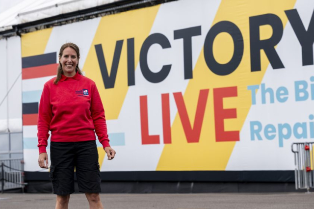 Emily Stokes standing outside Victory Live, the home of HMS Victory.
