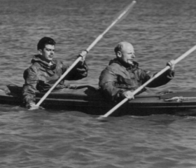 Archive photograph of Hasler and Stewart paddling a canoe at sea