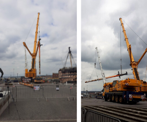 HMS Victory's masts being removed by crane. 