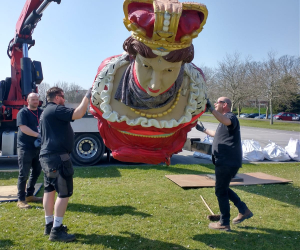 Contractors removing figurehead HMS Charlotte's figurehead in preparation for conservation.