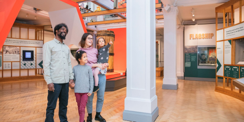 A family exploring the Victory Gallery.
