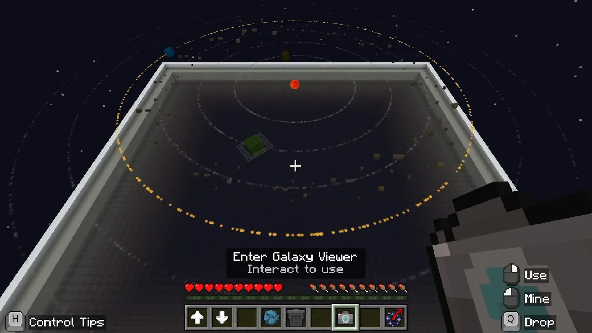 Minecraft Education screenshot of an in-game 'Galaxy Viewer' with orbiting planets and control tips